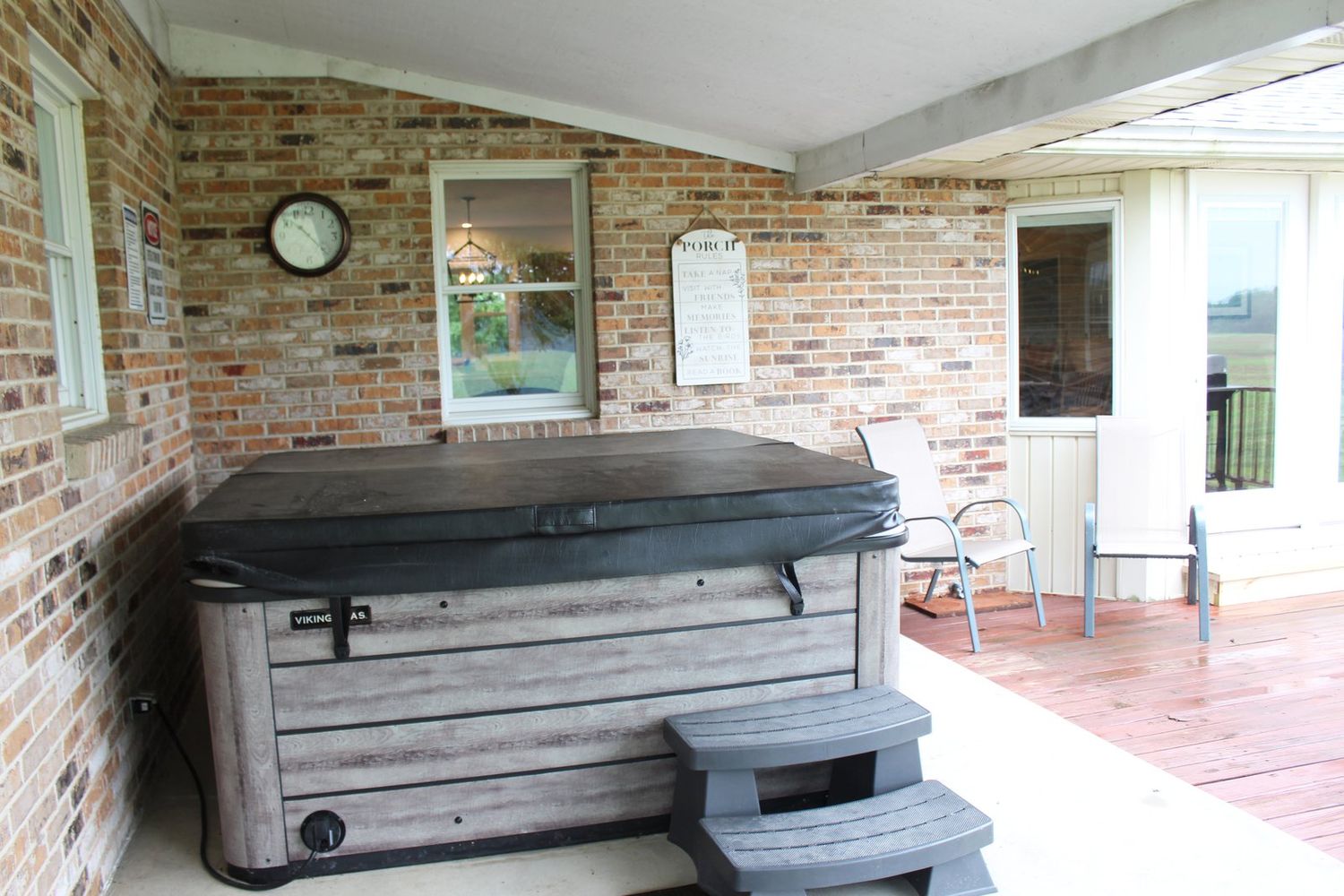 The private hot tub on the covered porch